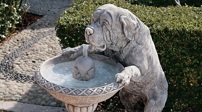 Photo of fountain with dog drinking out of it
