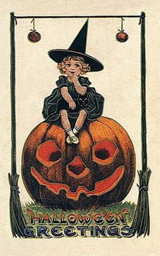 postcard of girl sitting on a pumpkin